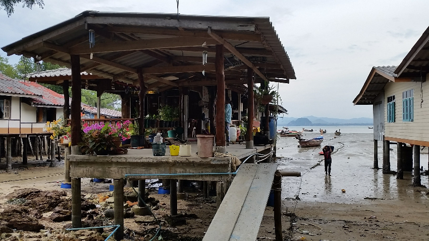 Shack on stilts on the water in Thailand