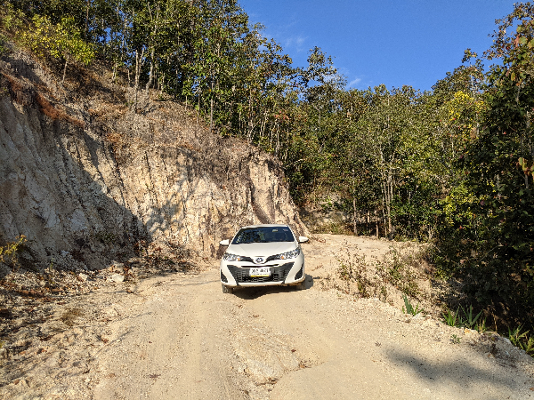 Rental car on dirt road